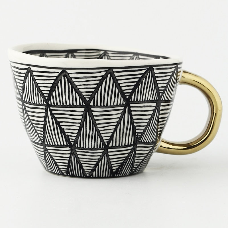 Maliben | Cup with abstract geometric pattern and gold handle