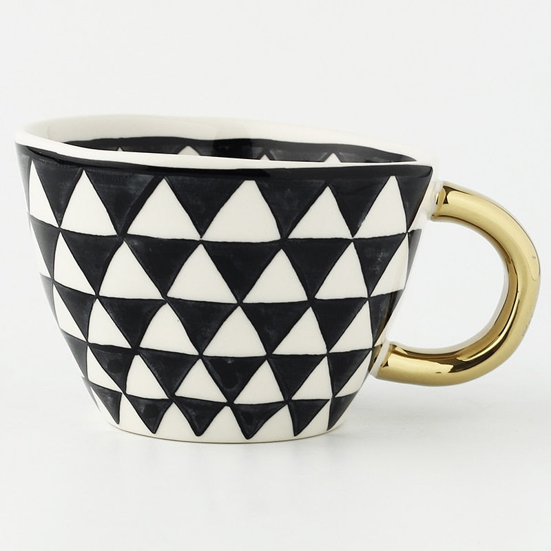 Maliben | Cup with abstract geometric pattern and gold handle