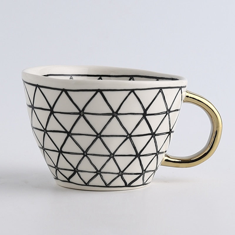Maliben | Cup with abstract geometric pattern and gold handle