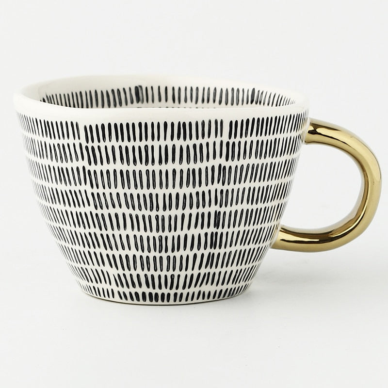 Maliben | Cup with abstract geometric pattern and gold handle