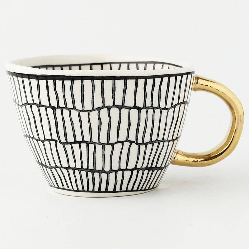 Maliben | Cup with abstract geometric pattern and gold handle