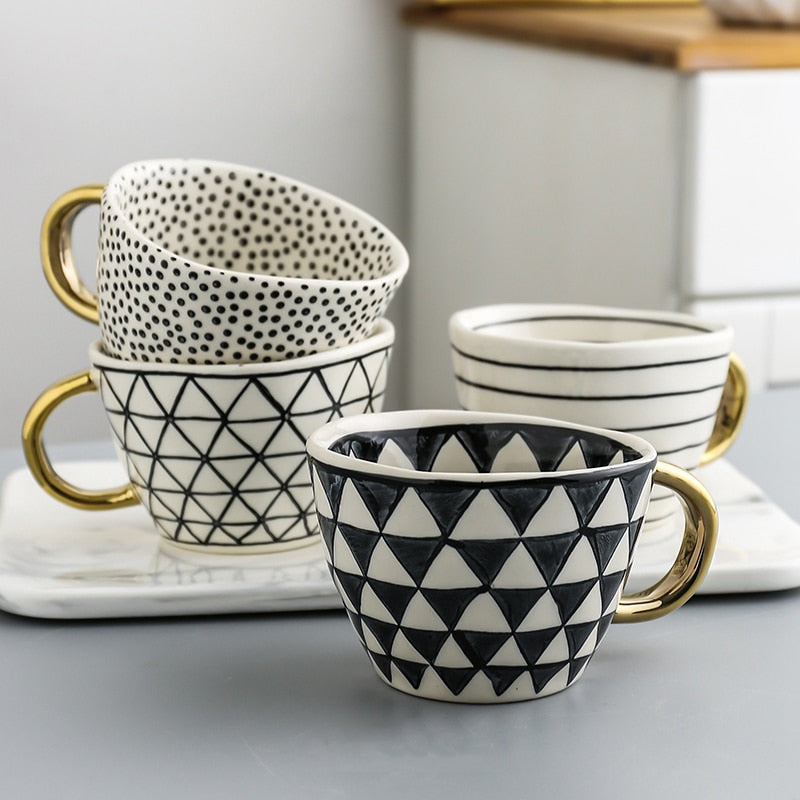 Maliben | Cup with abstract geometric pattern and gold handle