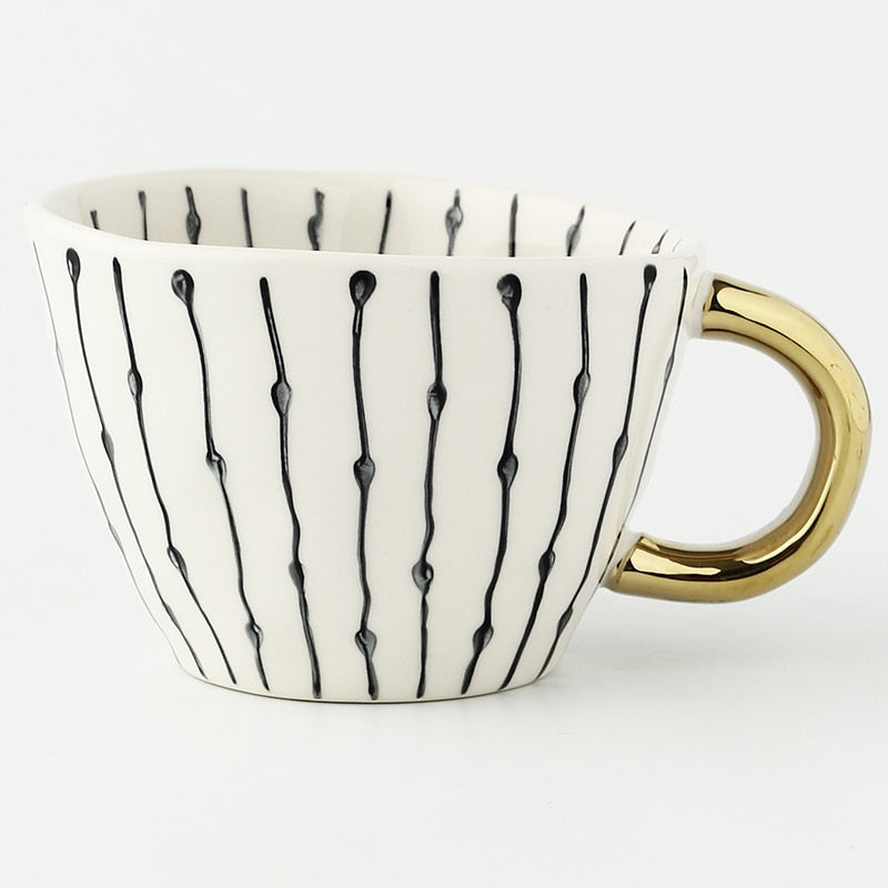 Maliben | Cup with abstract geometric pattern and gold handle