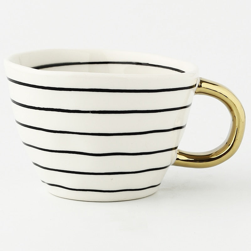Maliben | Cup with abstract geometric pattern and gold handle