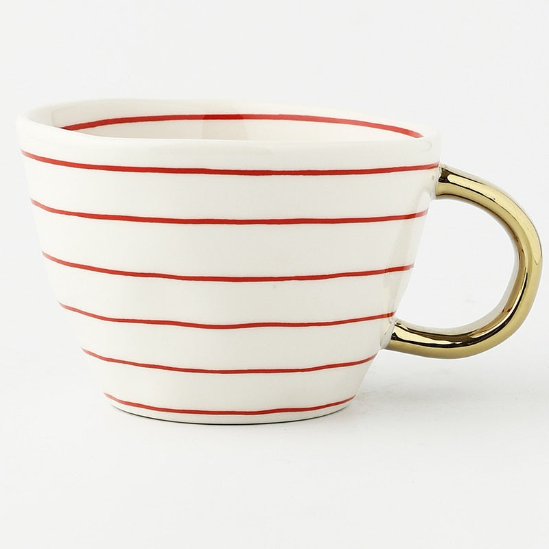 Maliben | Cup with abstract geometric pattern and gold handle