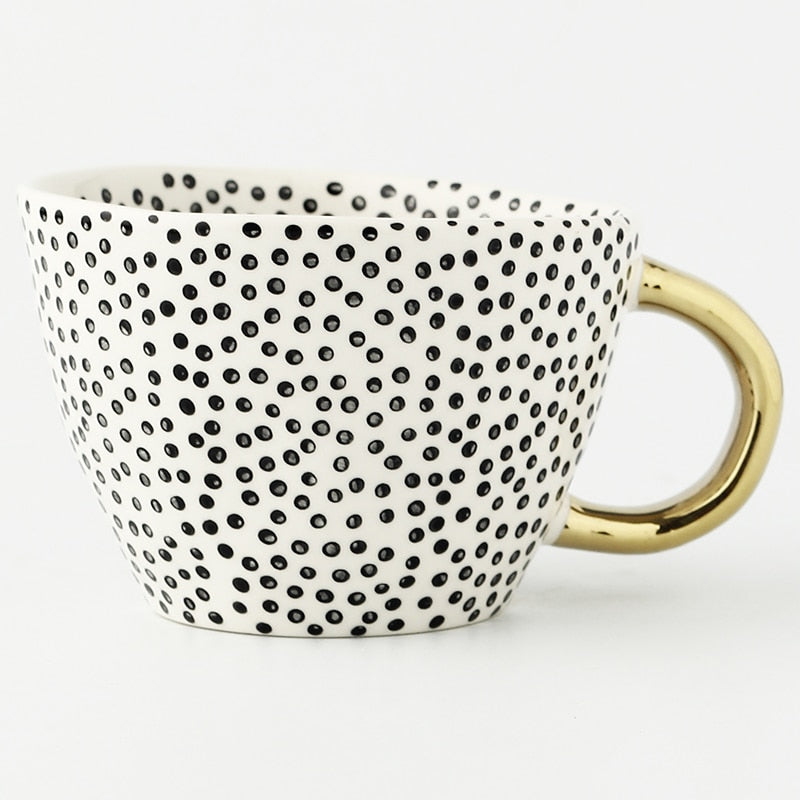 Maliben | Cup with abstract geometric pattern and gold handle