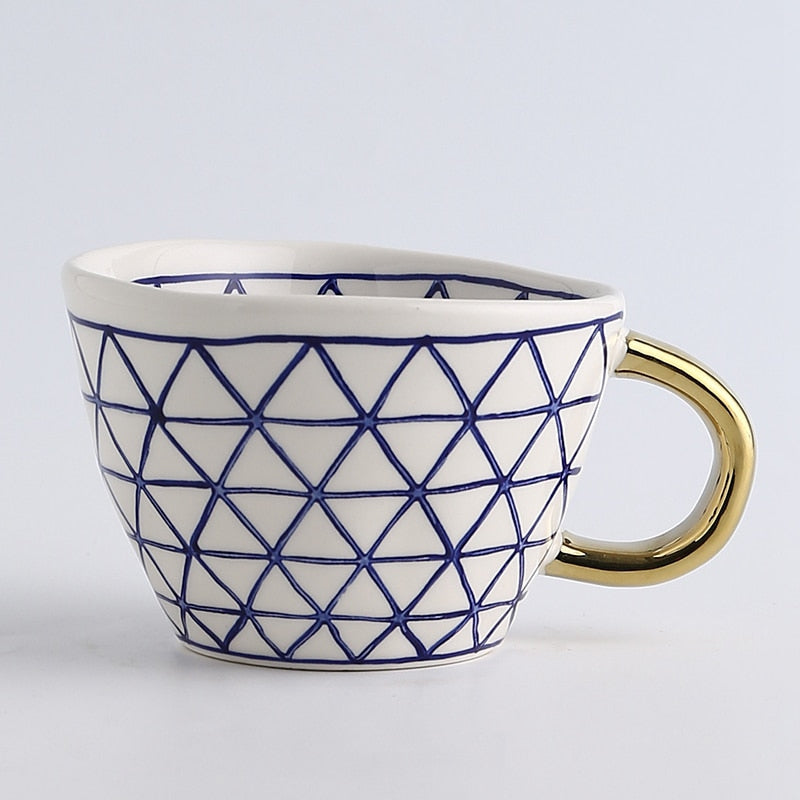 Maliben | Cup with abstract geometric pattern and gold handle