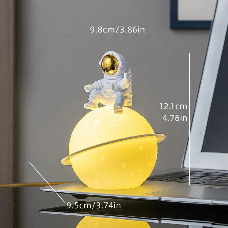 Maliben | Astrolume Astronaut Sculpture With Planet Night Light | Modern Decorative Highlight | Environmentally Friendly Pvc & Abs | 9.8 X 12.1 Cm