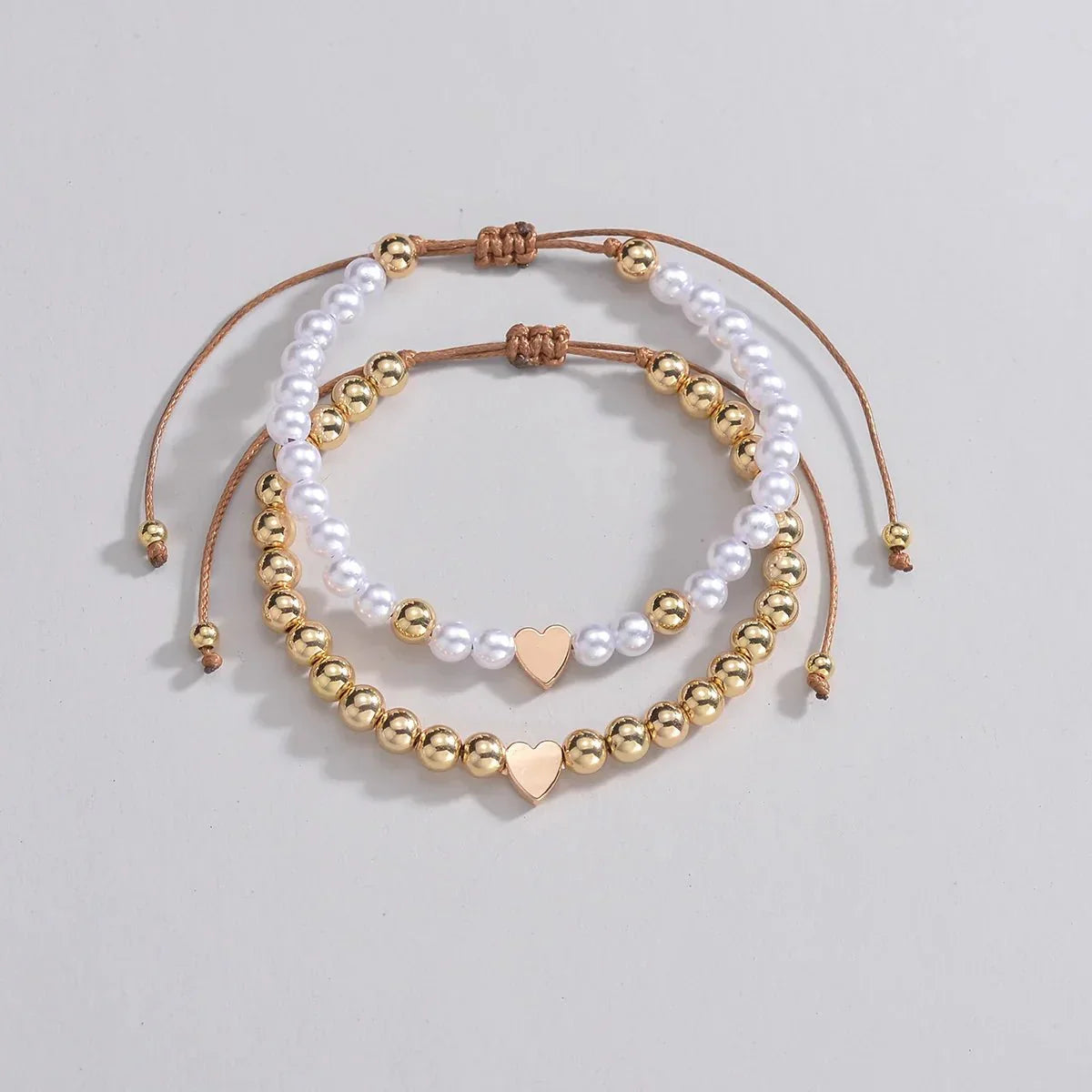 Maliben | 2pcs Classy White & Gold Beaded Heart Bracelets