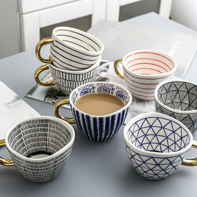 Maliben | Cup with abstract geometric pattern and gold handle