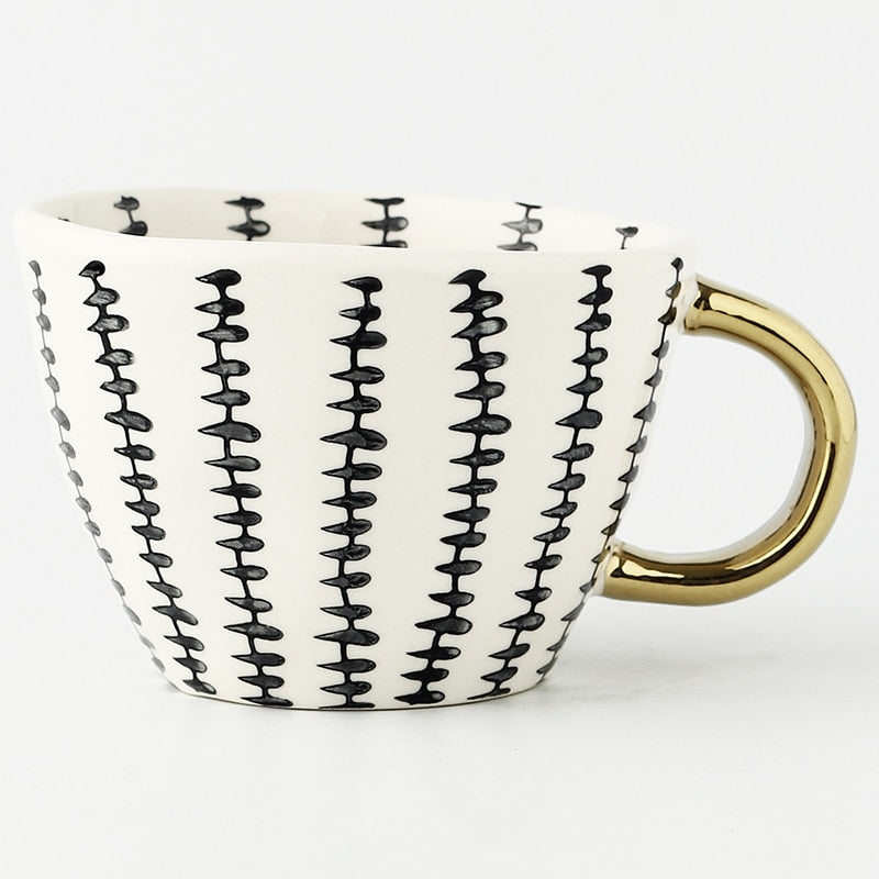Maliben | Cup with abstract geometric pattern and gold handle