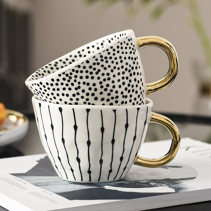 Maliben | Cup with abstract geometric pattern and gold handle