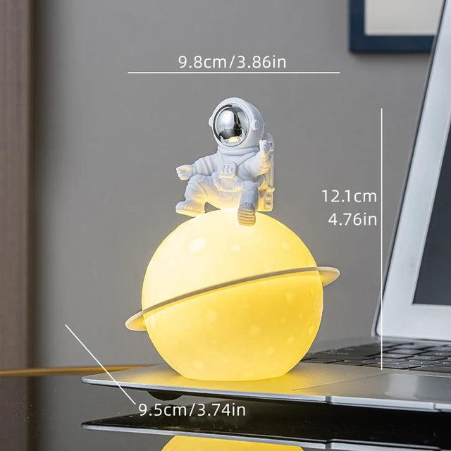 Maliben | Astrolume Astronaut Sculpture With Planet Night Light | Modern Decorative Highlight | Environmentally Friendly Pvc & Abs | 9.8 X 12.1 Cm