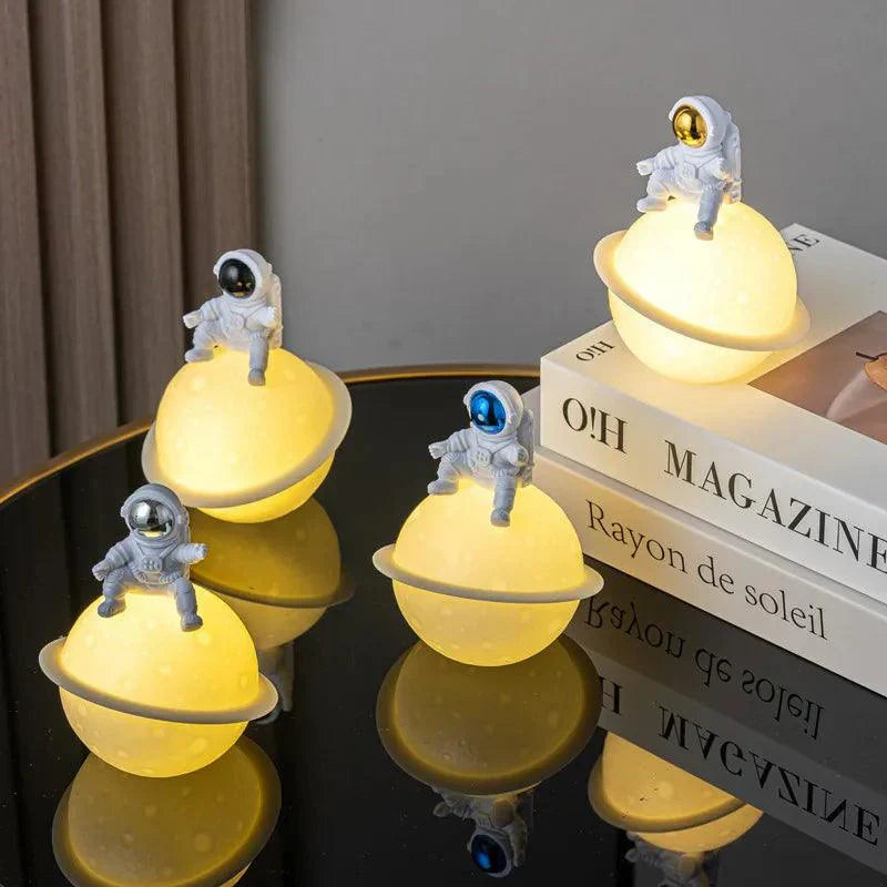 Maliben | Astrolume Astronaut Sculpture With Planet Night Light | Modern Decorative Highlight | Environmentally Friendly Pvc & Abs | 9.8 X 12.1 Cm