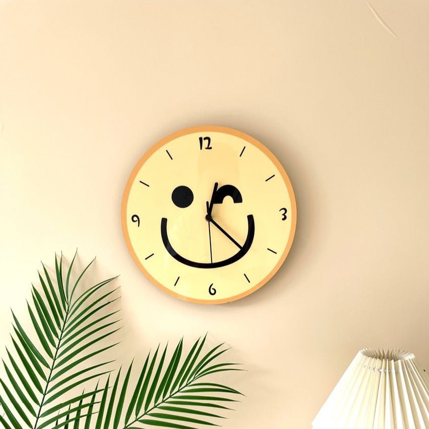 Wall clock with yellow smiley cartoon — Maliben bedroom