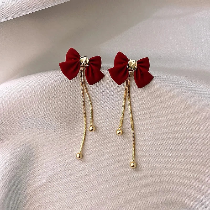 Maliben | Dainty Bow Gold Dangle Earrings
