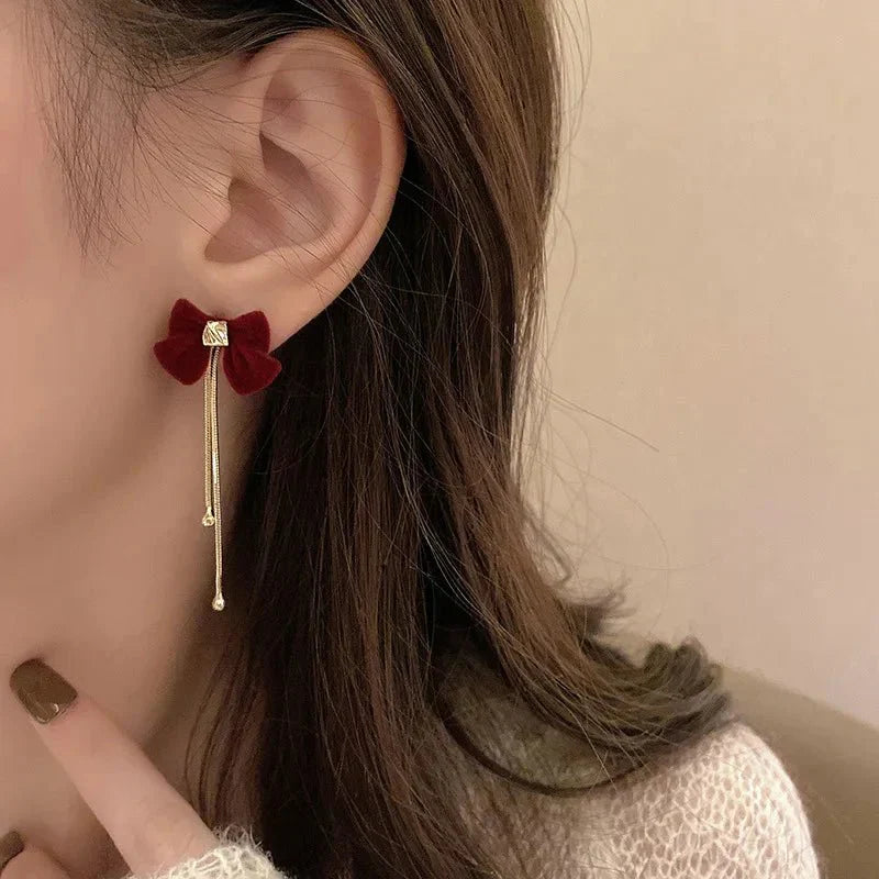 Maliben | Dainty Bow Gold Dangle Earrings