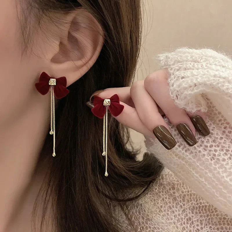 Maliben | Dainty Bow Gold Dangle Earrings