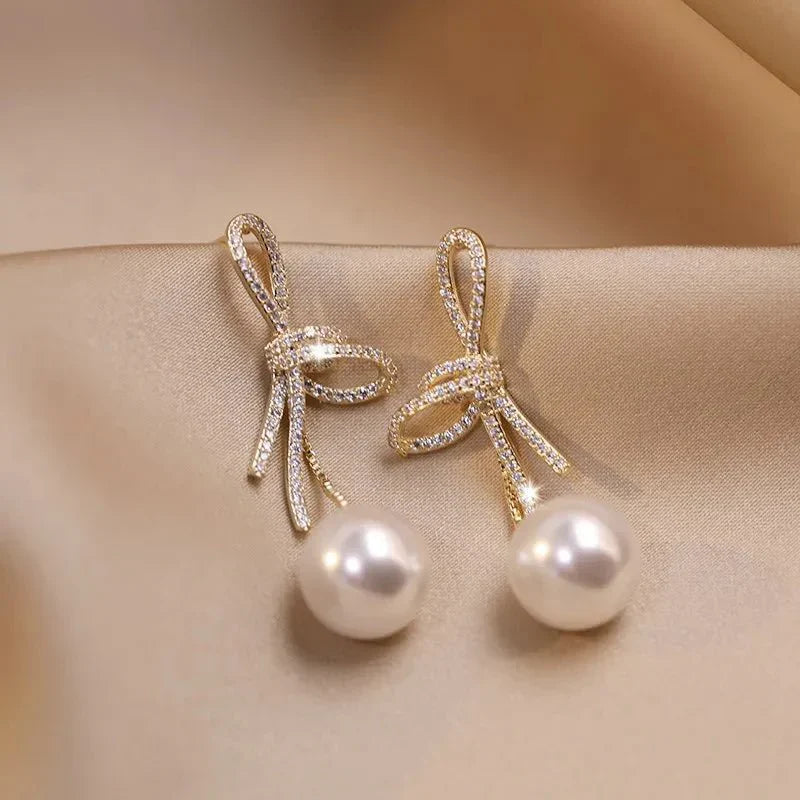 Maliben | Dazzling Bowknot Pearl Drop Earrings