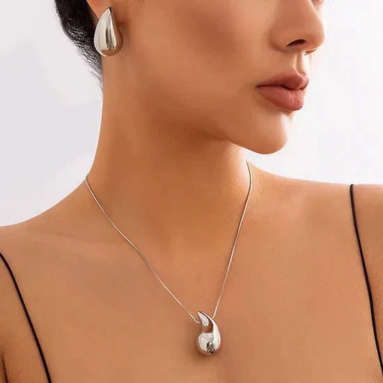 Maliben | Women's Elegant Gold Teardrop Earrings | Sleek Polished Design
