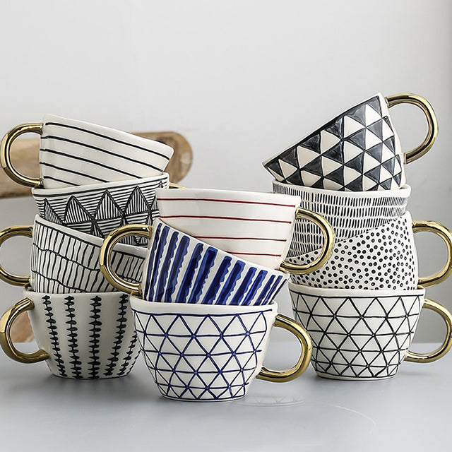 Maliben | Cup with abstract geometric pattern and gold handle